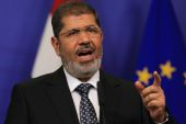 Članak 236. poništava sve zakone i deklaracije, uključujući i sporni Morsijev dekret, koji su prethodili usvajanju novog ustava (EPA)