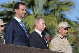 Russian President Putin, Defence Minister Shoigu and Syrian President Bashar al-Assad visit the Hmeymim air base in Latakia Province