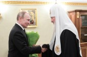 Predsjednik Putin i patrijarh Kiril su blisko povezani (Reuters)