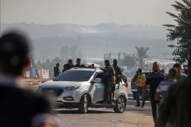 Borci iz brigada Al-Qassam na putu ka prelazu Erez u sjevernom pojasu Gaze 7. oktobra (AFP)
