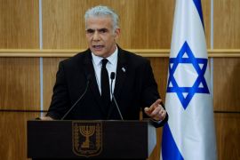 Yair Lapid je pozvao Netanyahua da podnese ostavku zbog propusta koji su napravljeni prilikom napada Hamasa na Izrael 7. oktobra pro&scaron;le godine (REUTERS/Amir Cohen)
